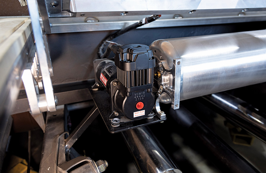 VIAIR 444C compressor mounted beside a polished air tank for air suspension