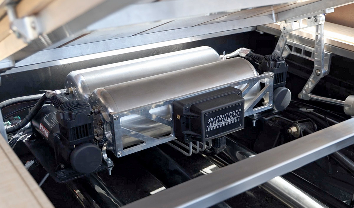 Completed air suspension system neatly mounted under the wood truck bed