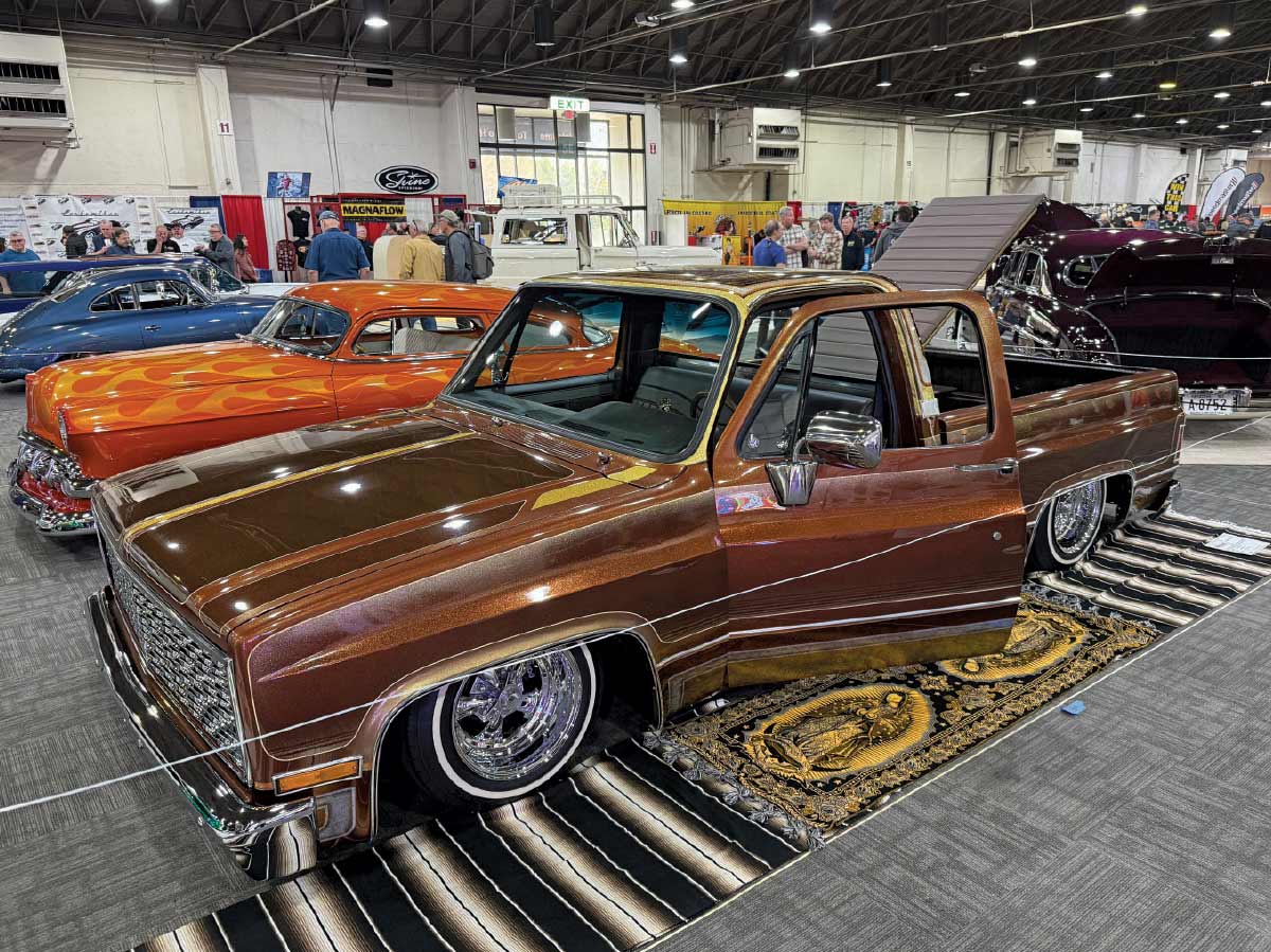 3/4 side view of brown truck with yellow and light brown accents