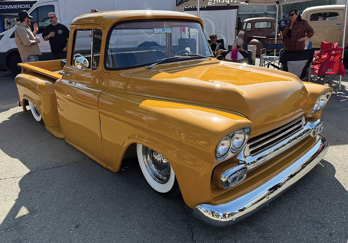 3/4 side view of mustard yellow truck