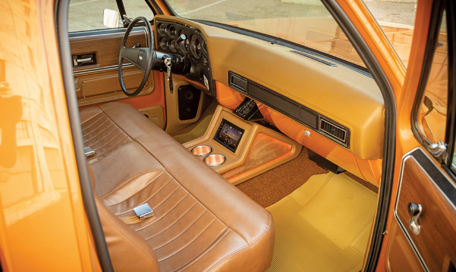 Custom 1973 Chevy C10 interior brown leather bench seat