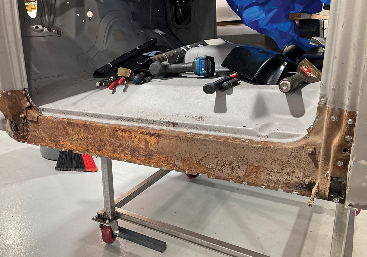 New replacement rocker panel and cab support parts ready for installation