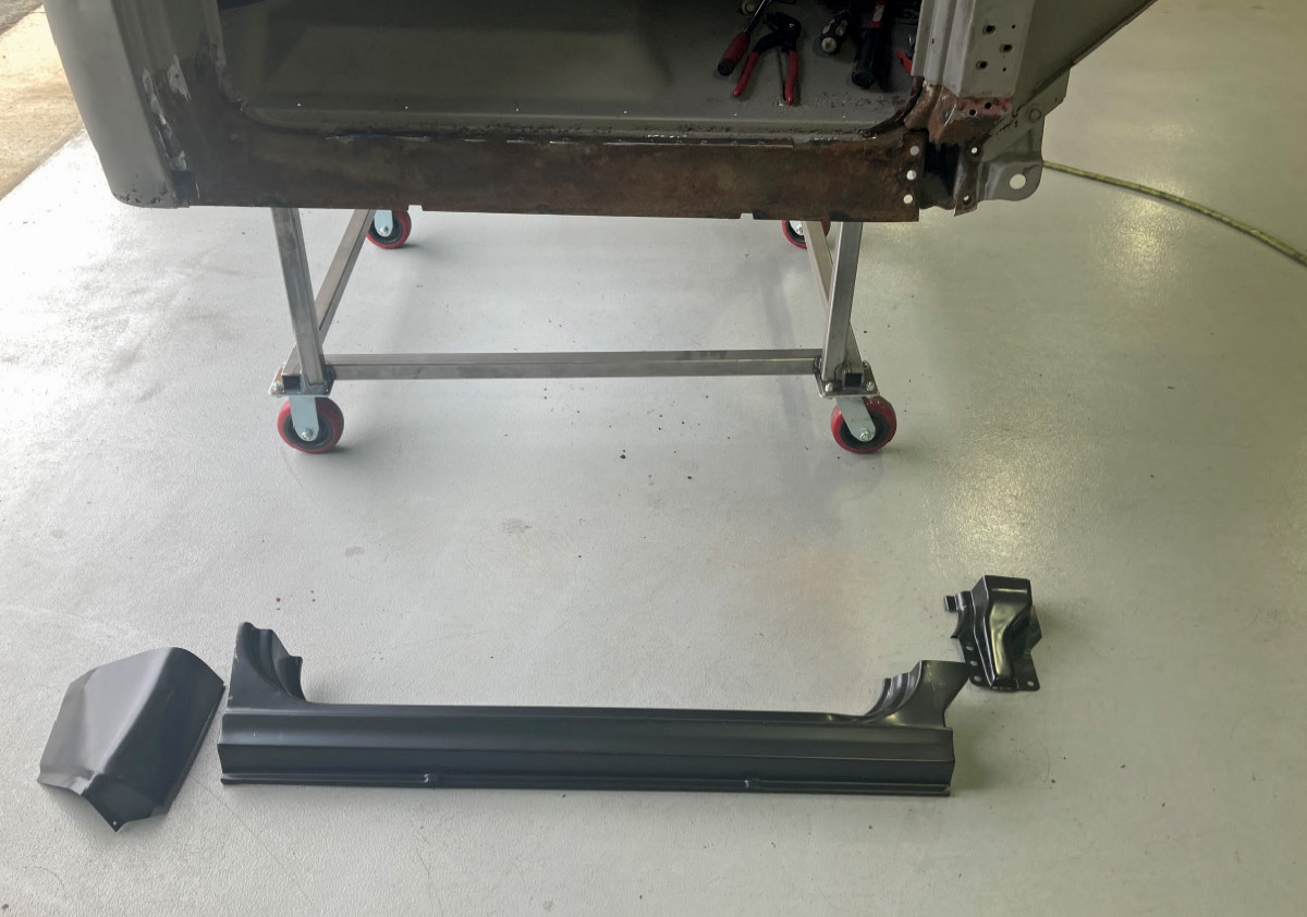 Tools and equipment laid out for precise metal fabrication and welding