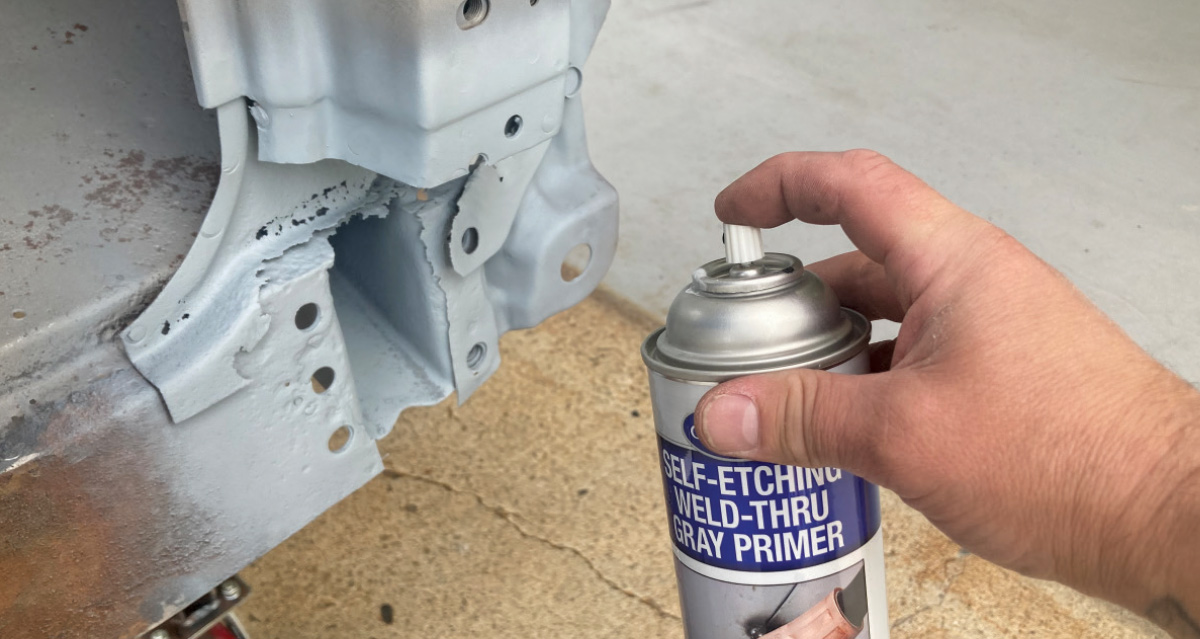 Self-etching weld-through primer being applied to the prepped metal surface