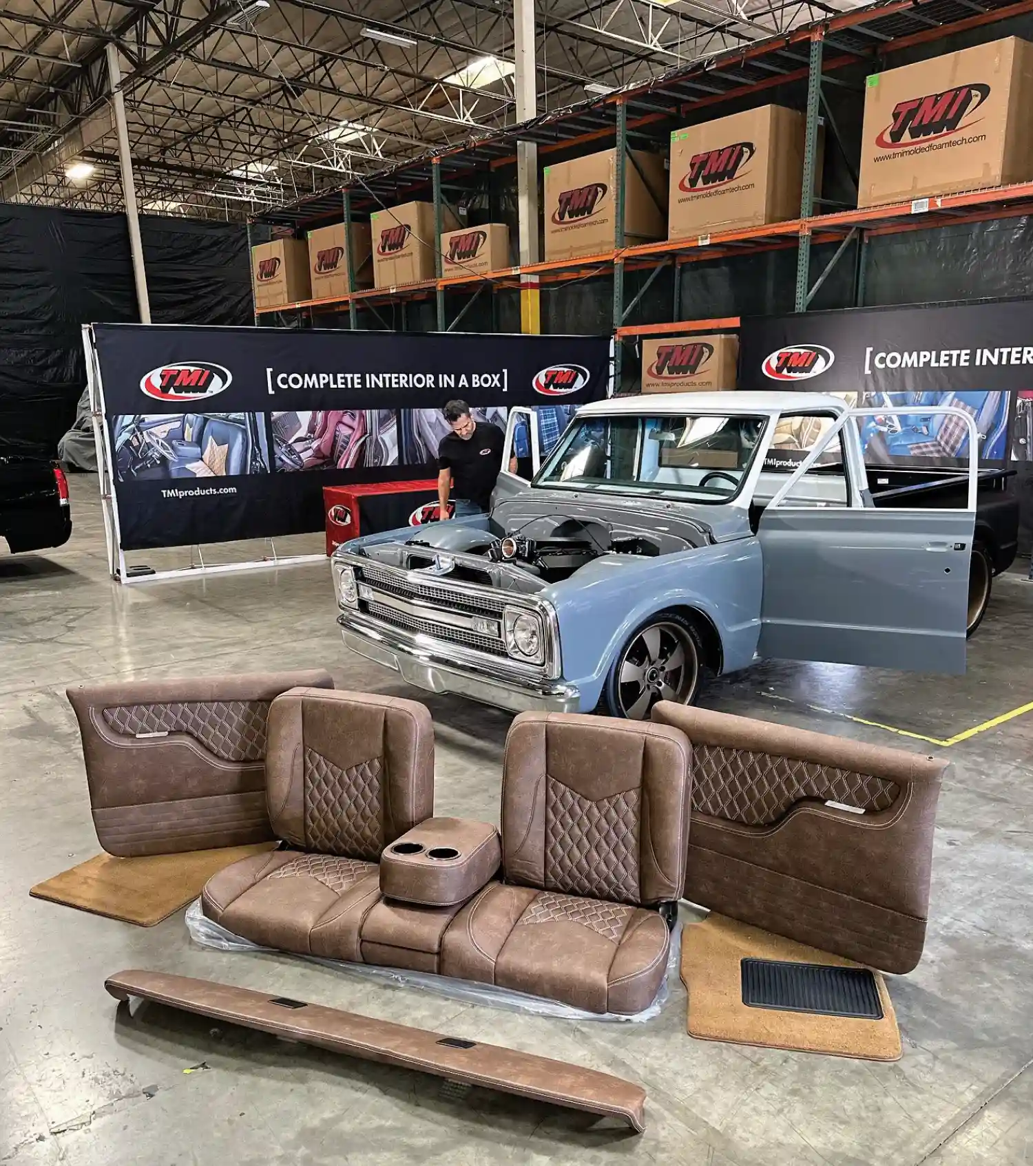 Restored Chevrolet C10 receiving full TMI interior upgrade in a workshop setting
