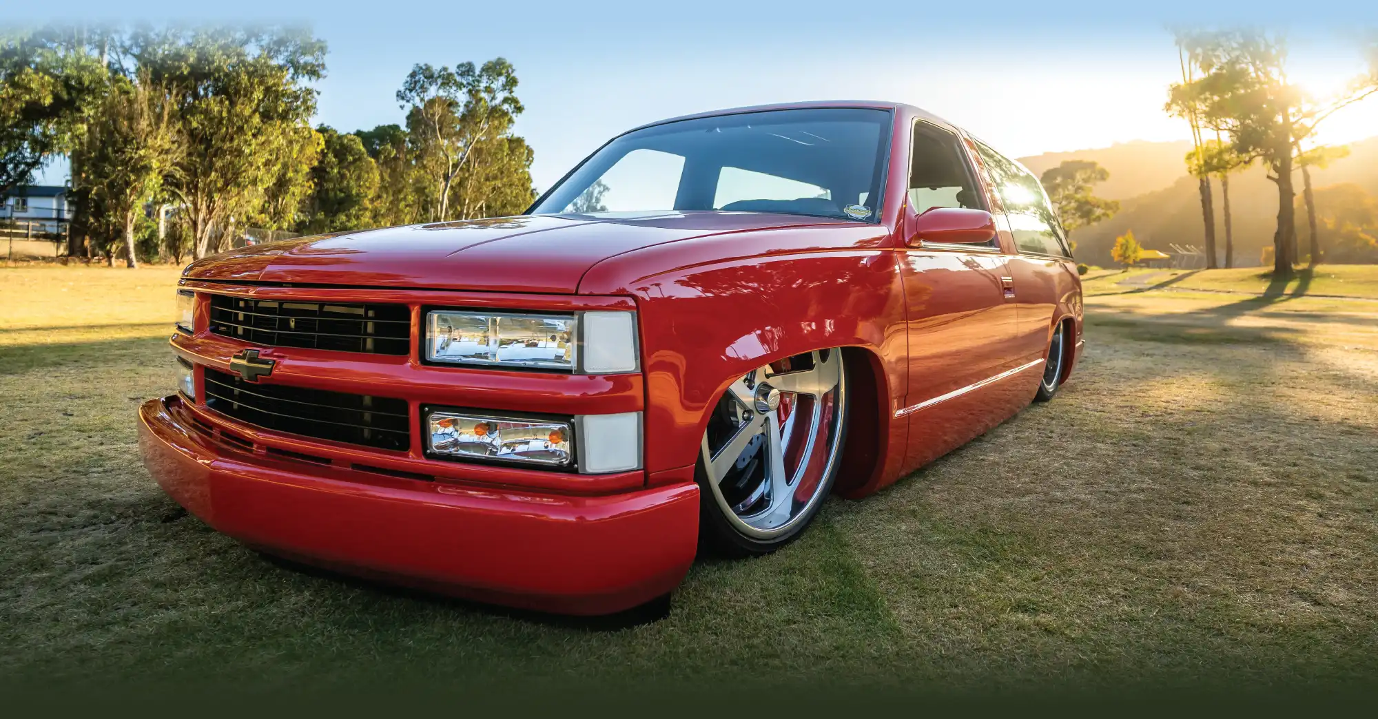 1996 Chevrolet Tahoe sport truck with air suspension and red paint