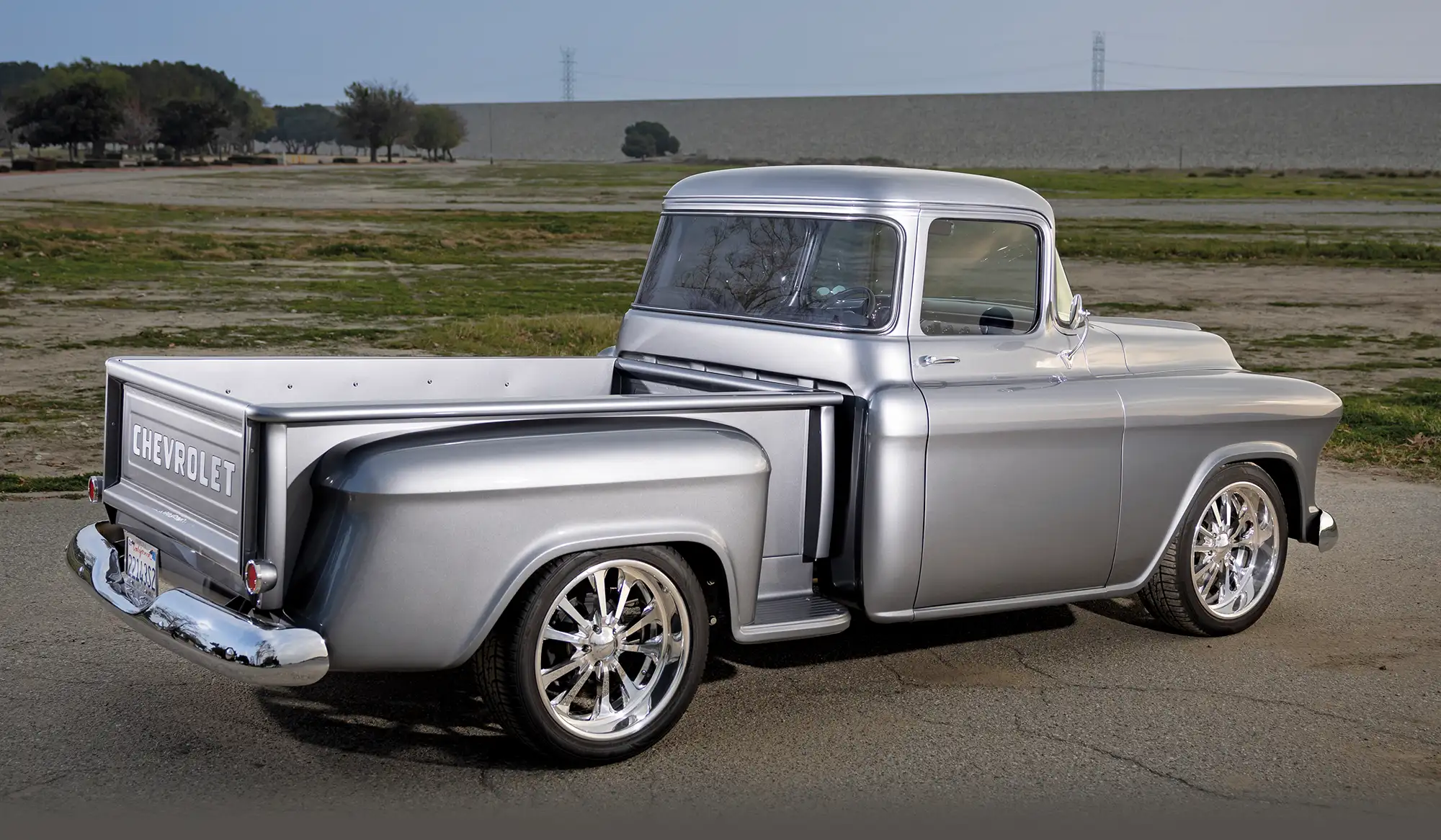 1957 Chevrolet custom truck showing rear fender curves and flush tailgate fitment