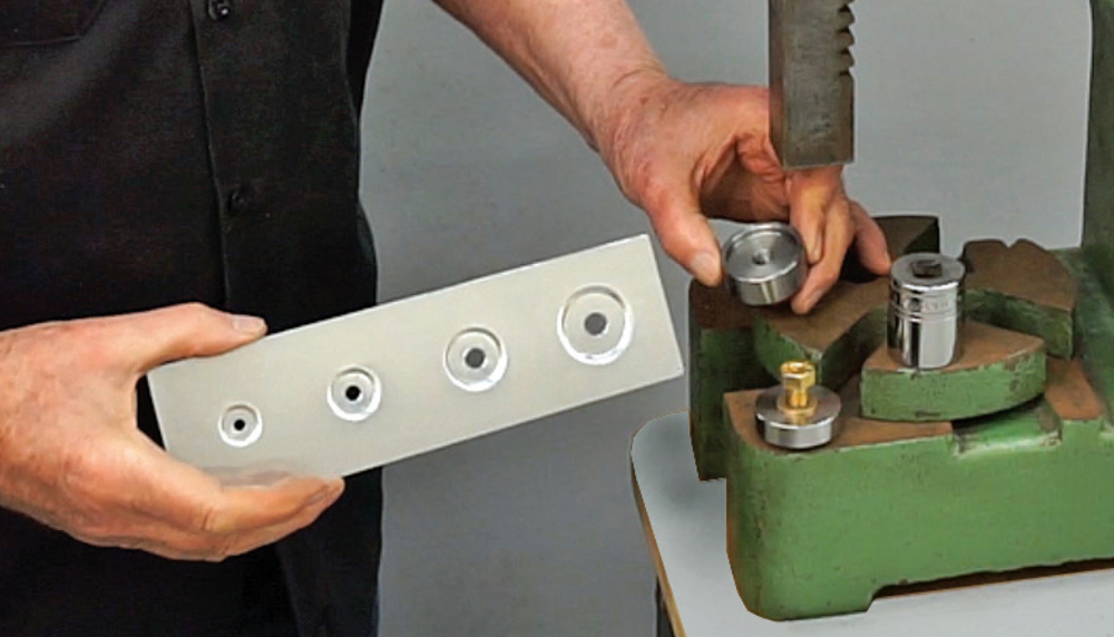 finished metal strip showcasing evenly spaced, pressed dimple holes