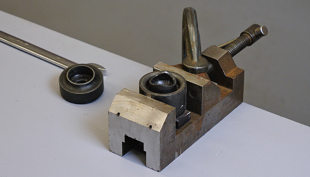 heavy-duty metal press fixture used for shaping and strengthening sheet metal