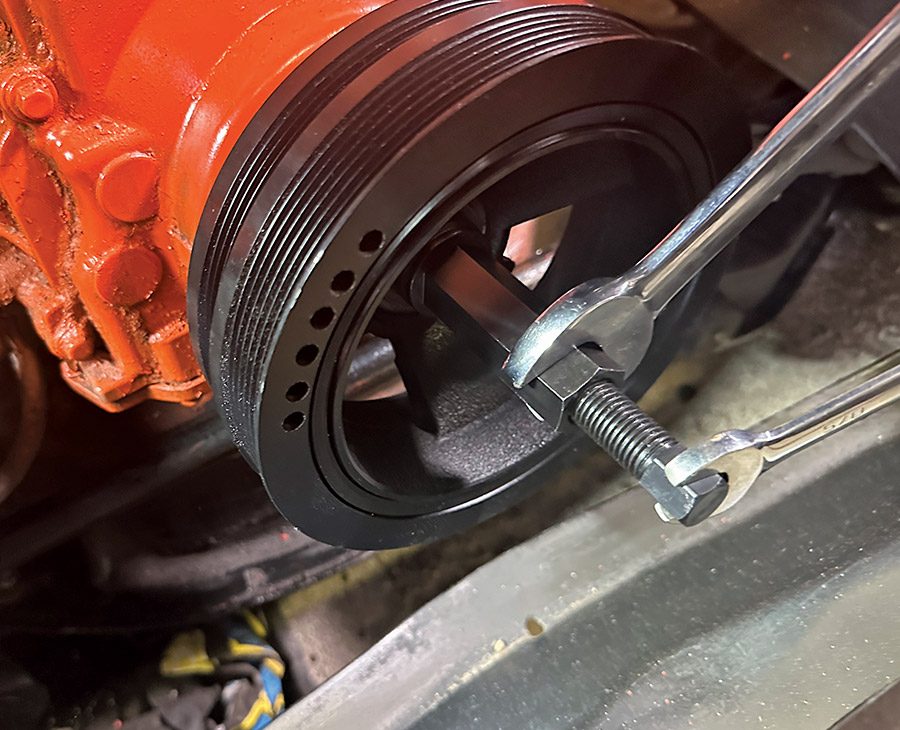 New crank pulley being installed using the ARP tool and dual wrench method