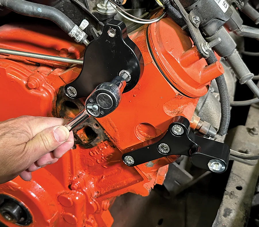 Driver side Billet Specialties mounting bracket torqued in place for power steering setup