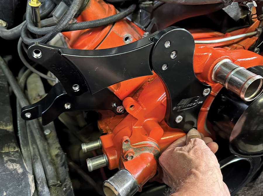 Billet Specialties driver side bracket fully installed and torqued on an LS water pump