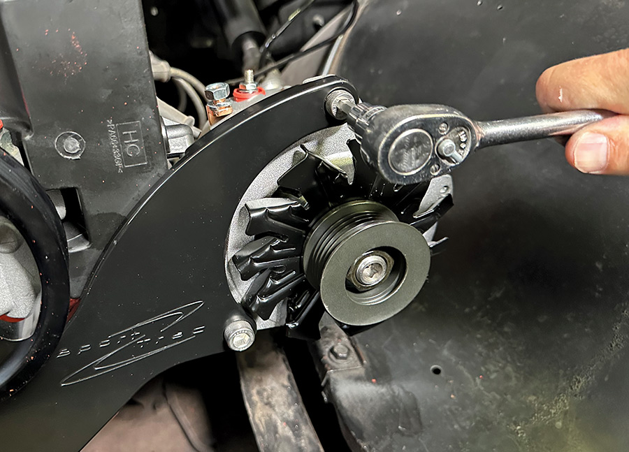 Powermaster alternator bolted up to passenger side Billet bracket