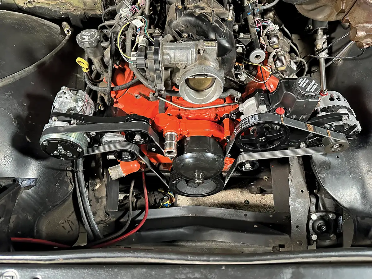 Clean front engine shot with serpentine drive, alternator, and AC installed using Billet Specialties Tru Trac kit