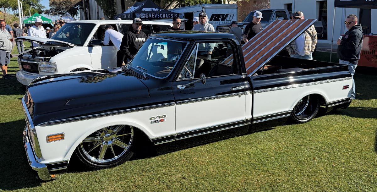 1971 Chevrolet C10 Cheyenne in blackwhite two-tone with custom wood bed floor and show suspension