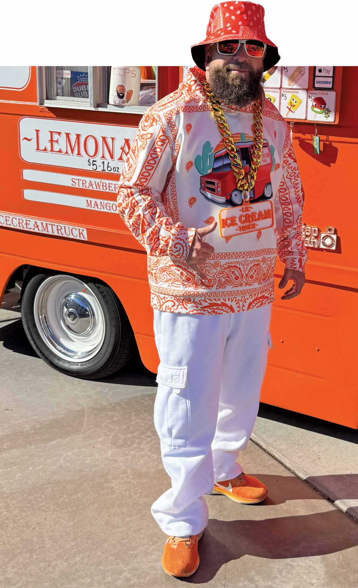 1970s-style ice cream truck with retro graphics and low-profile whitewall wheels