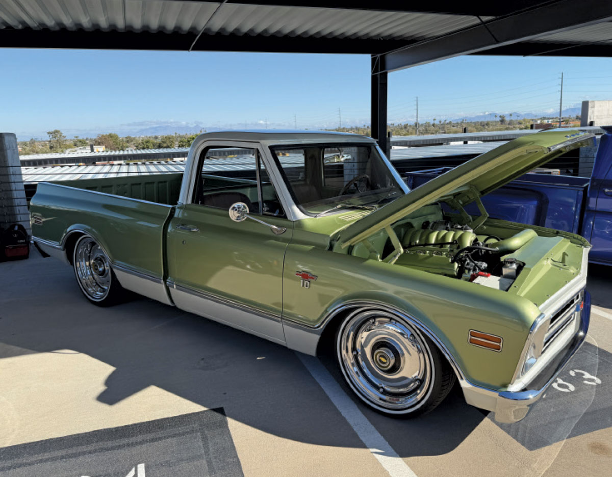 1969 Chevy C10 in olive greenwhite two-tone featuring a color-matched LS swap and Billet Specialties wheels