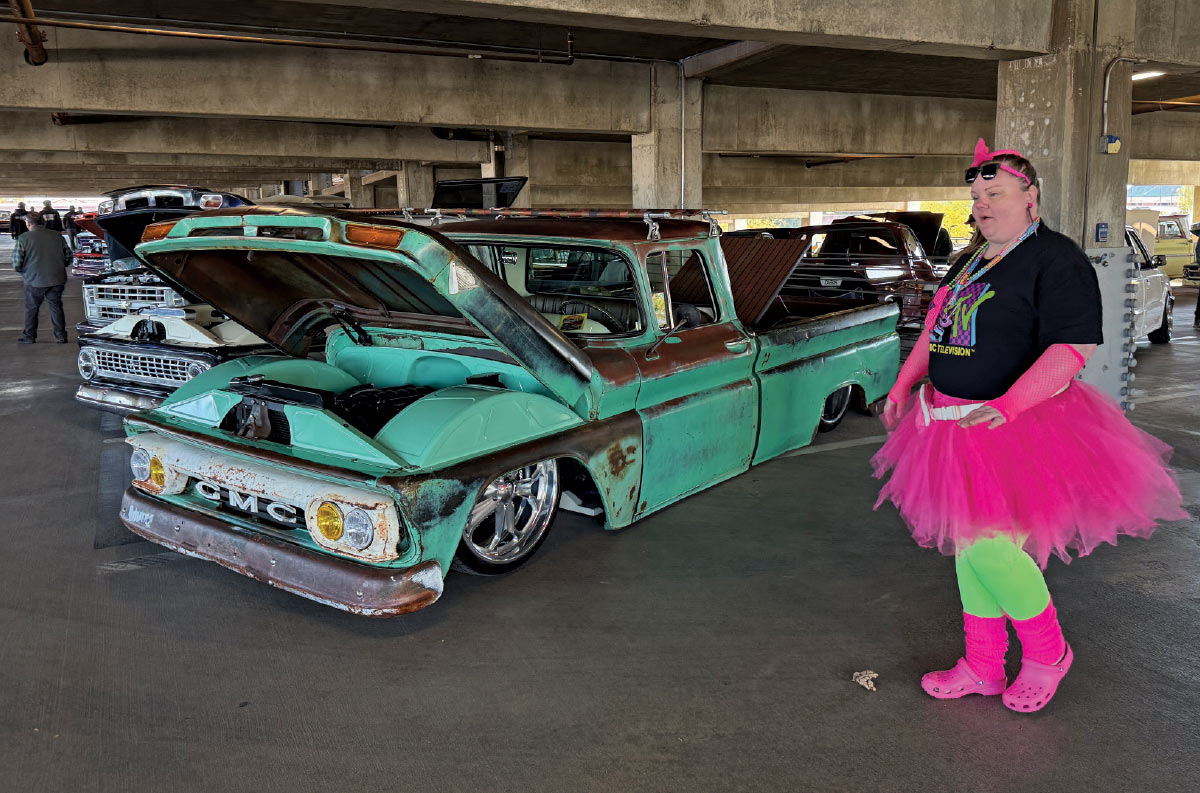 Custom 1960 GMC Suburban with patina and full air ride setup, detailed in seafoam and rust