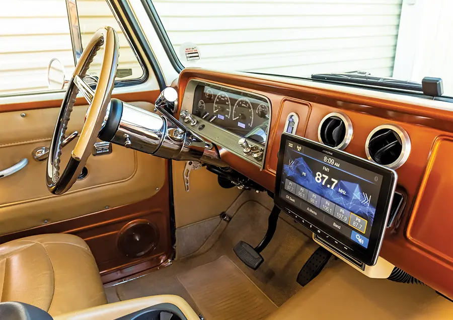1966 Chevy Suburban features an Alpine touchscreen system, retro gauges, and billet aluminum vents