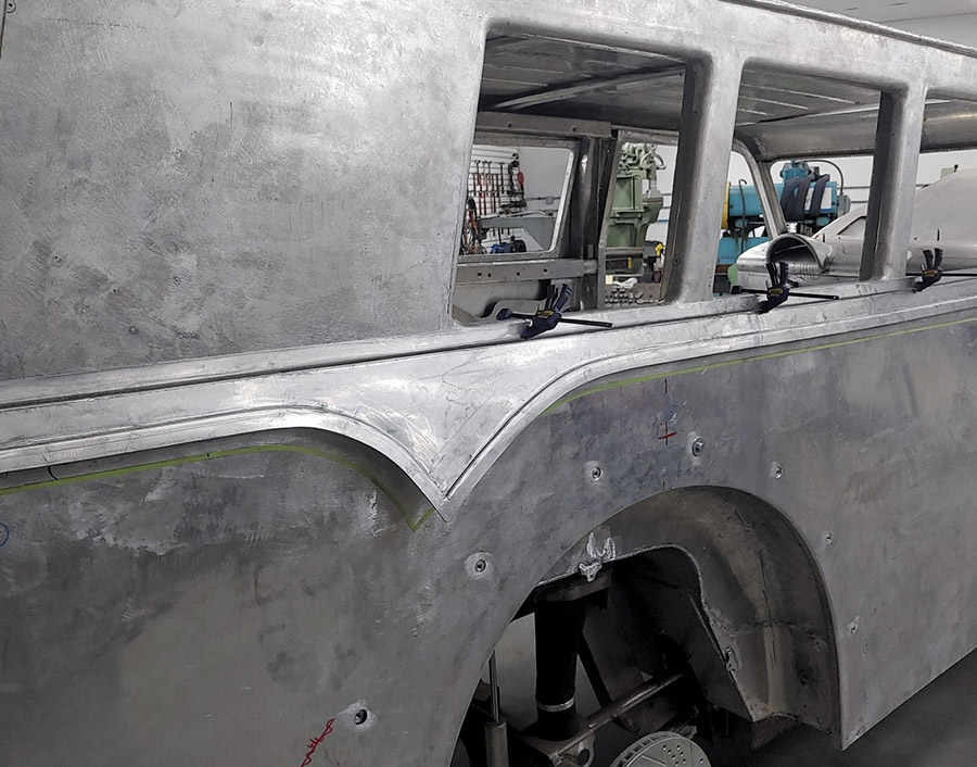 1938 Divco upper rear quarter window trim clamped for test fitting