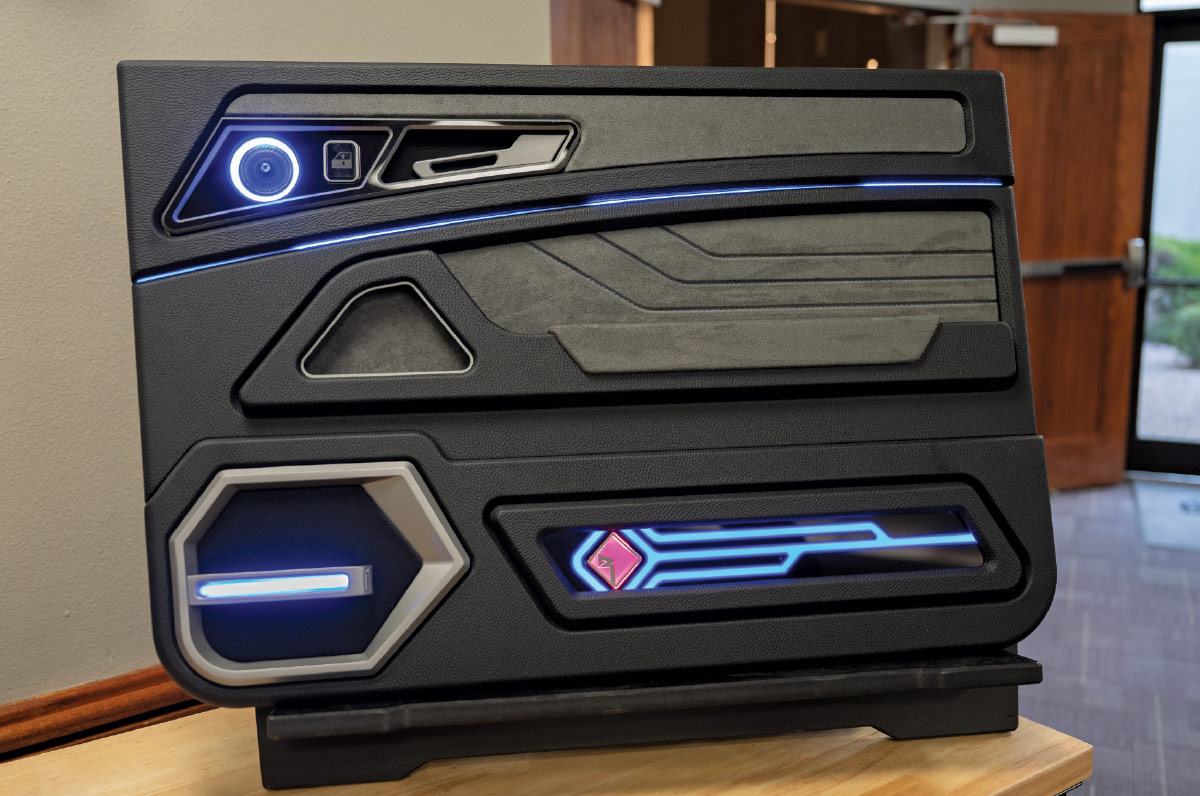 Mobile Tech Expo illuminated door panel LED trim suede inserts futuristic automotive design