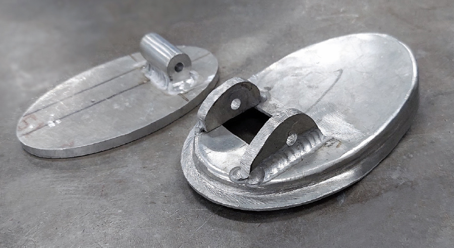 view of handle’s pivots fabricated and welded to both parts