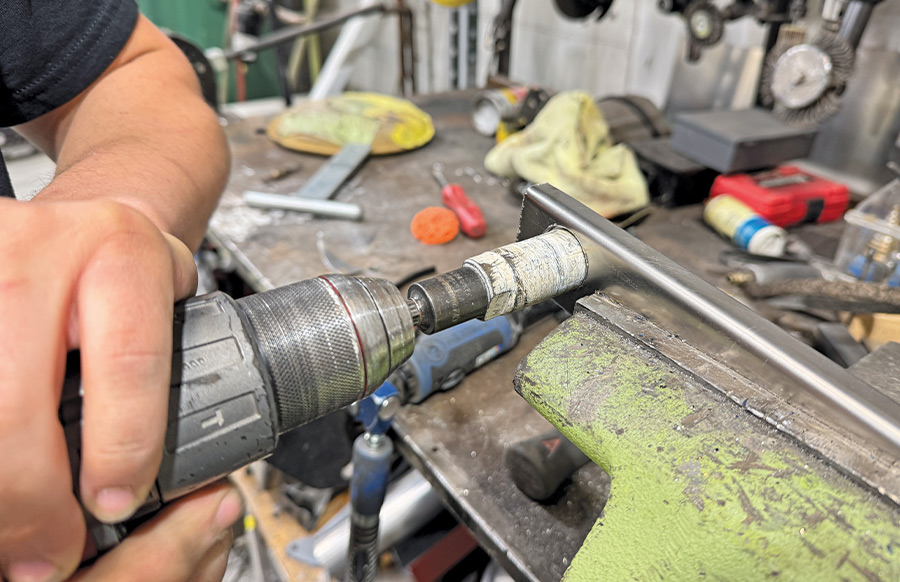 chevy c10 stake pocket bolt tube prep in drill with fixture