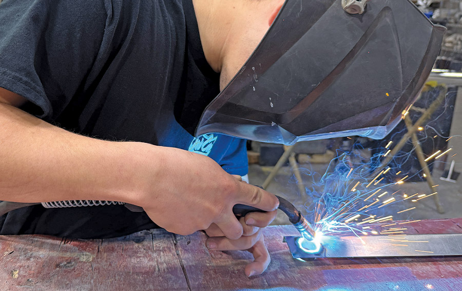 chevy c10 stake pocket weld tube to bracket on workbench MIG