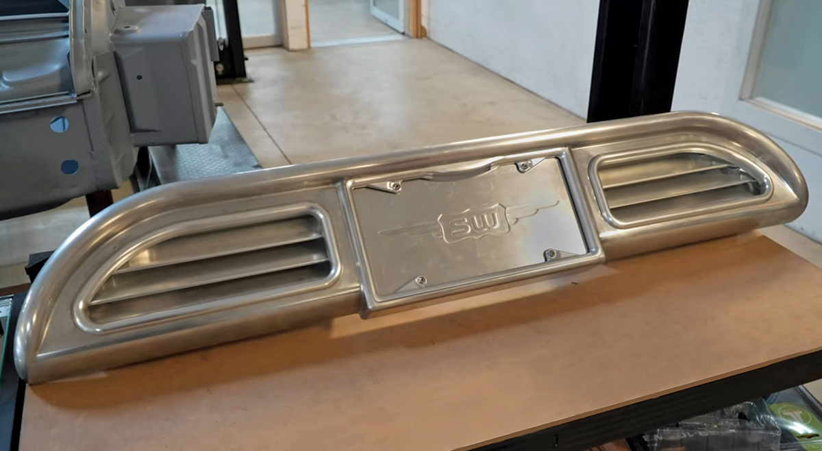 Divco custom rear license panel with billet vents and SW logo plate mount in hand-formed metal