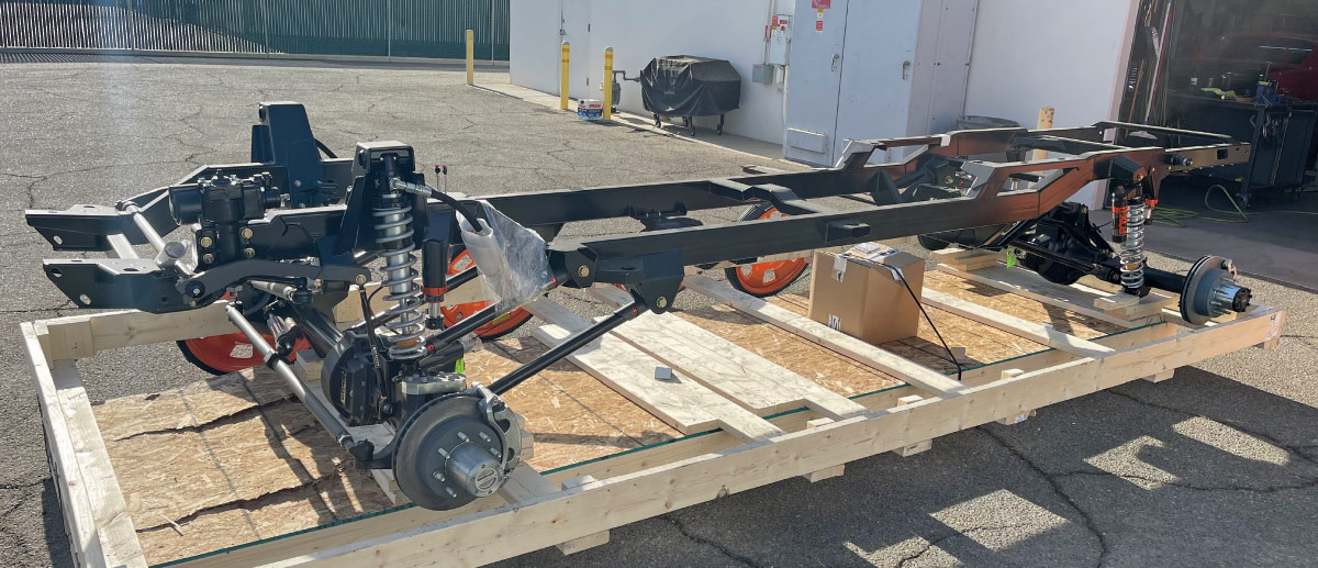 1985 chevy squarebody rtech coilover chassis mocked up on shipping pallet with boxed frame