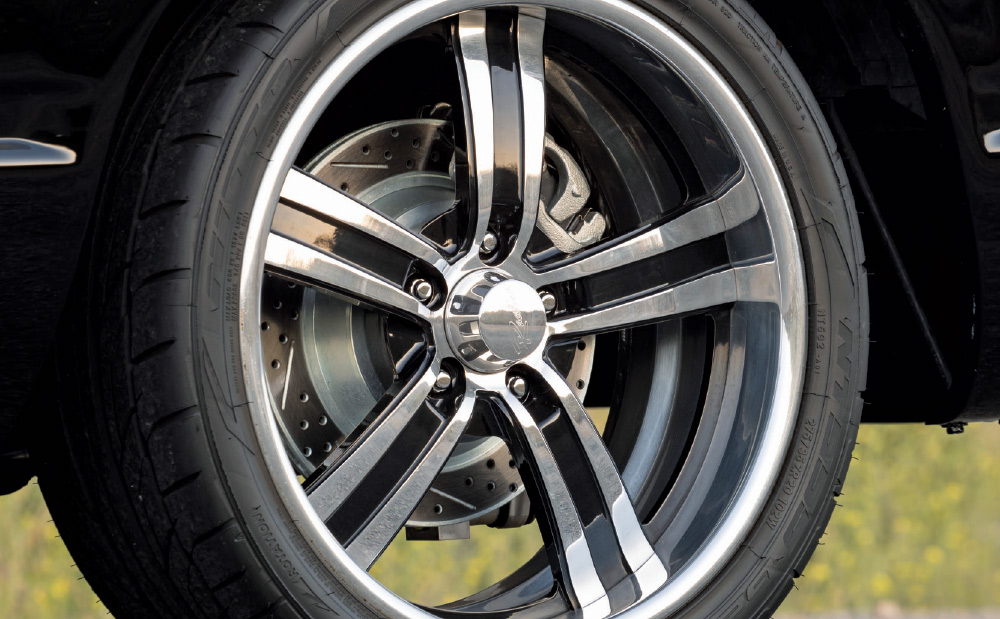 1996 gmc obs rear wheel detail intro billet polished five-spoke and nitto performance tire