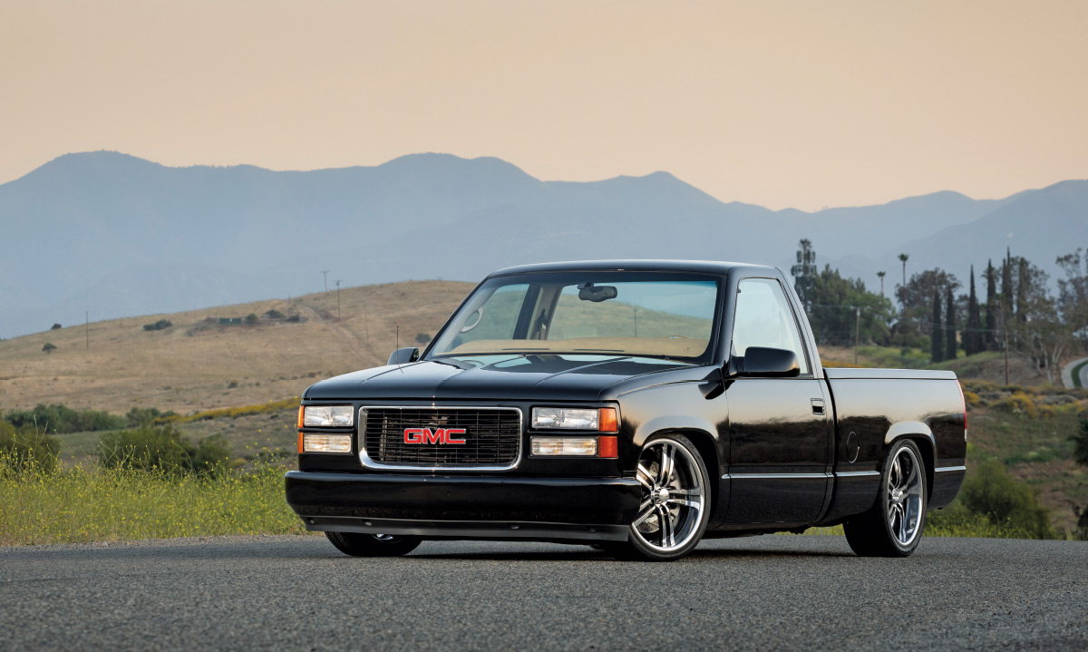 1996 gmc obs pickup static drop stance black paint tucked wheels wide front view