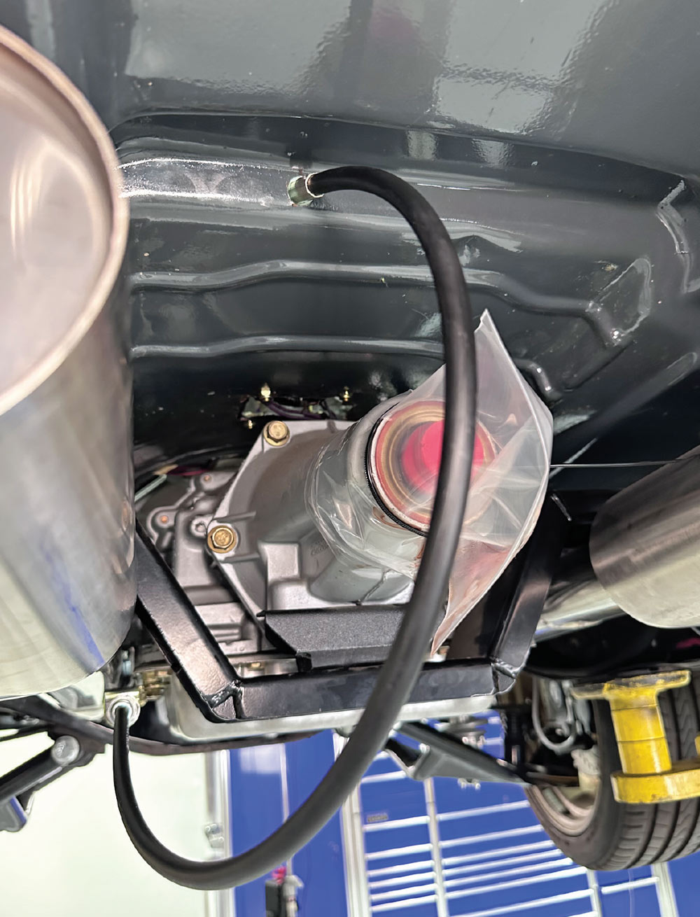 lokar sport shifter cable routed through floor to trans tunnel support