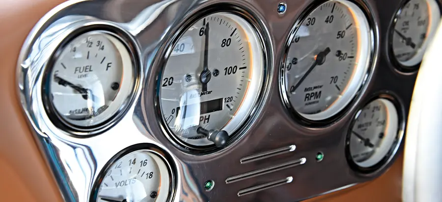 1955 Ford F-100 custom AutoMeter gauges polished cluster RPM speed fuel volts