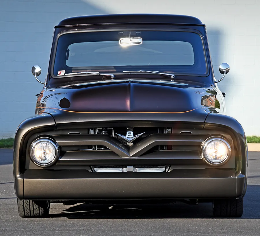 1955 Ford F-100 front view restomod custom paint smooth bumper V8 emblem