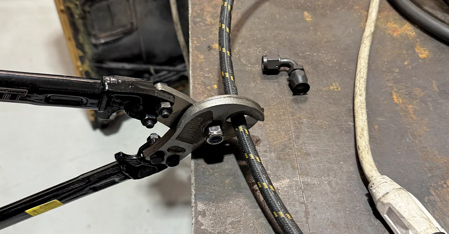 Pure Stealth braided line cut with crimper AN hose prep for fitting install