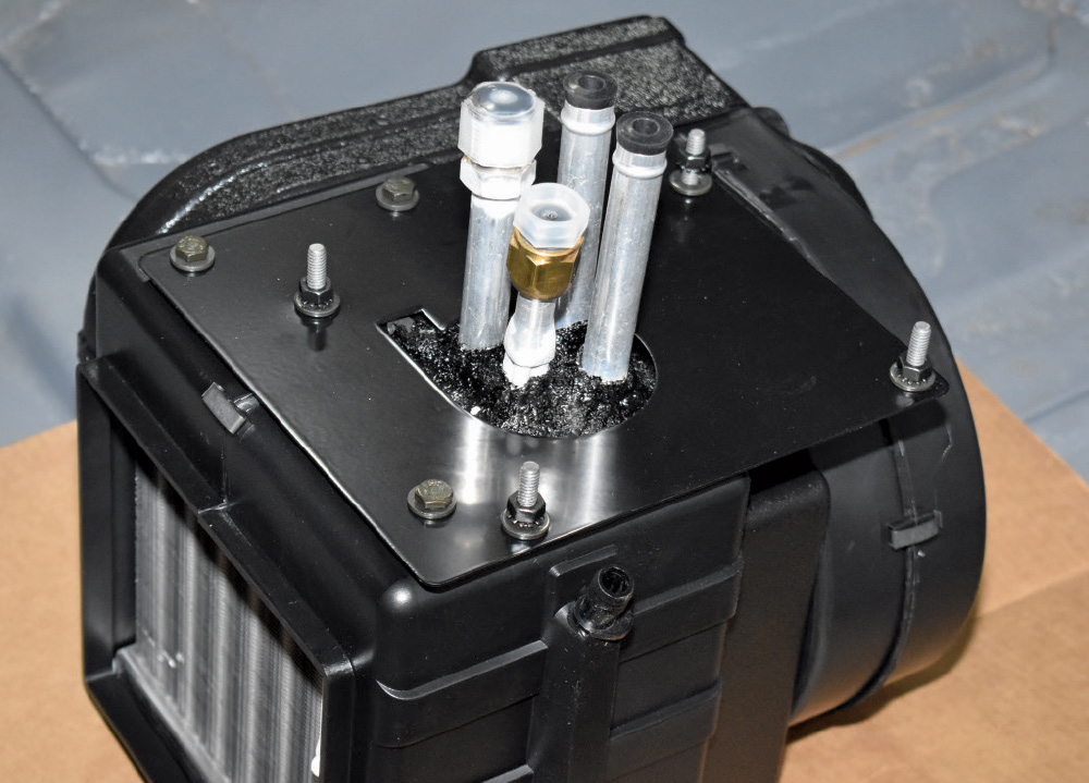 1951 Chevy AC evaporator input output port close-up fittings heater core plumbing