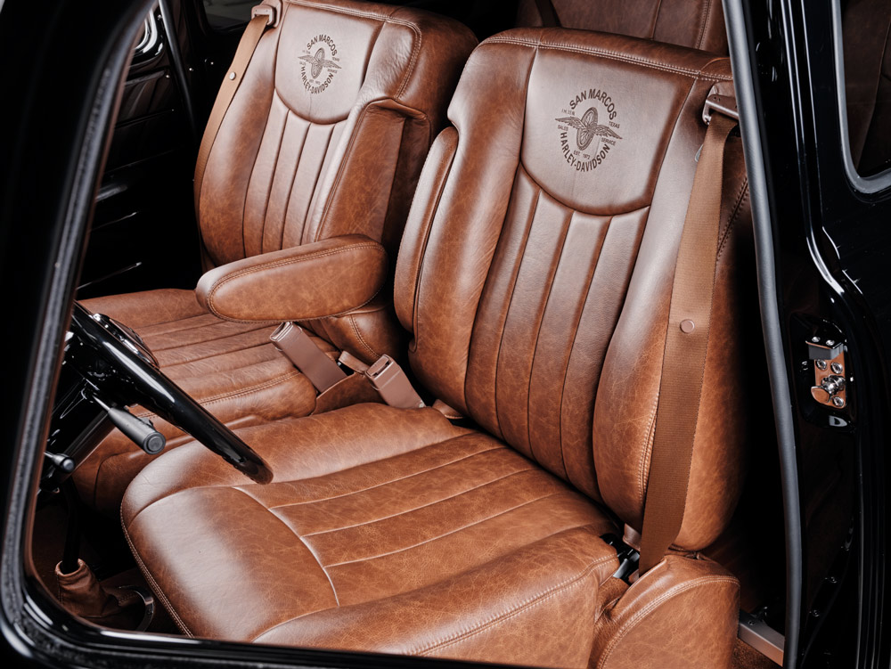 1952 Chevy Suburban front seats, tan leather, armrest, SAN MARCOS HARLEY-DAVIDSON TEXAS seat stitching