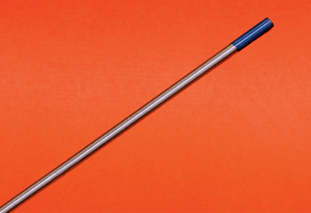 Single TIG tungsten electrode, blue tip, close-up on orange background