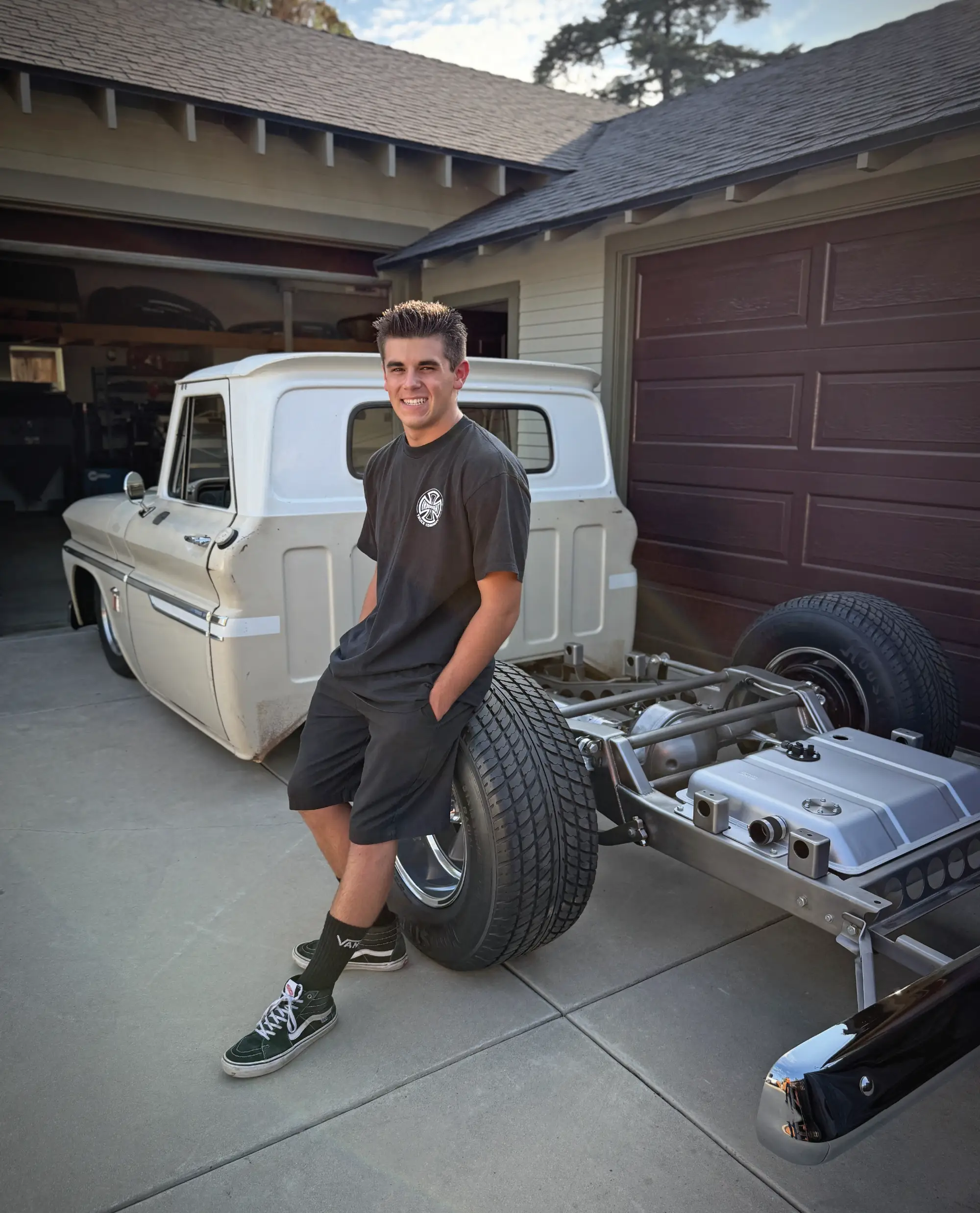 Chevrolet C10 truck, custom chassis modification, garage driveway