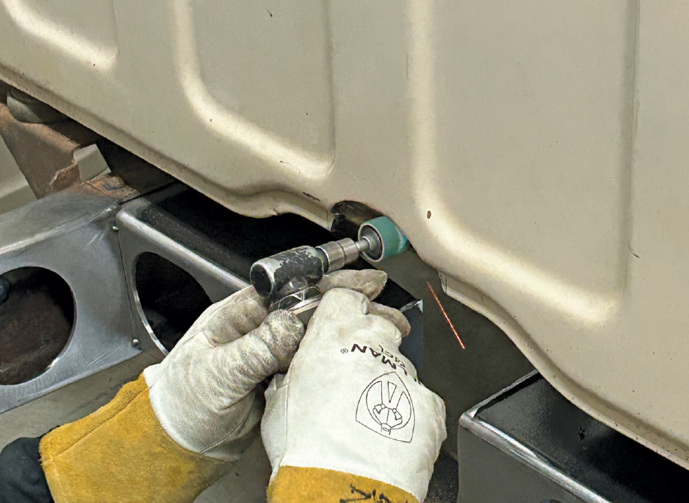 Welding underside notch in rocker panel, custom chassis, 1960s Chevrolet C10 truck modification