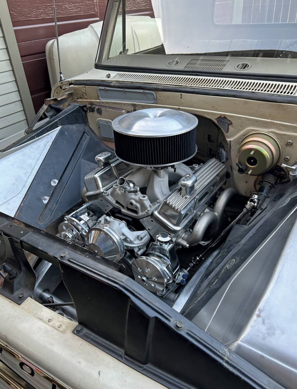 V8 engine installed in engine bay, aluminum details, air cleaner, 1960s Chevrolet C10