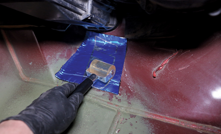 1995 Chevrolet Suburban applying Noico sound deadening roller