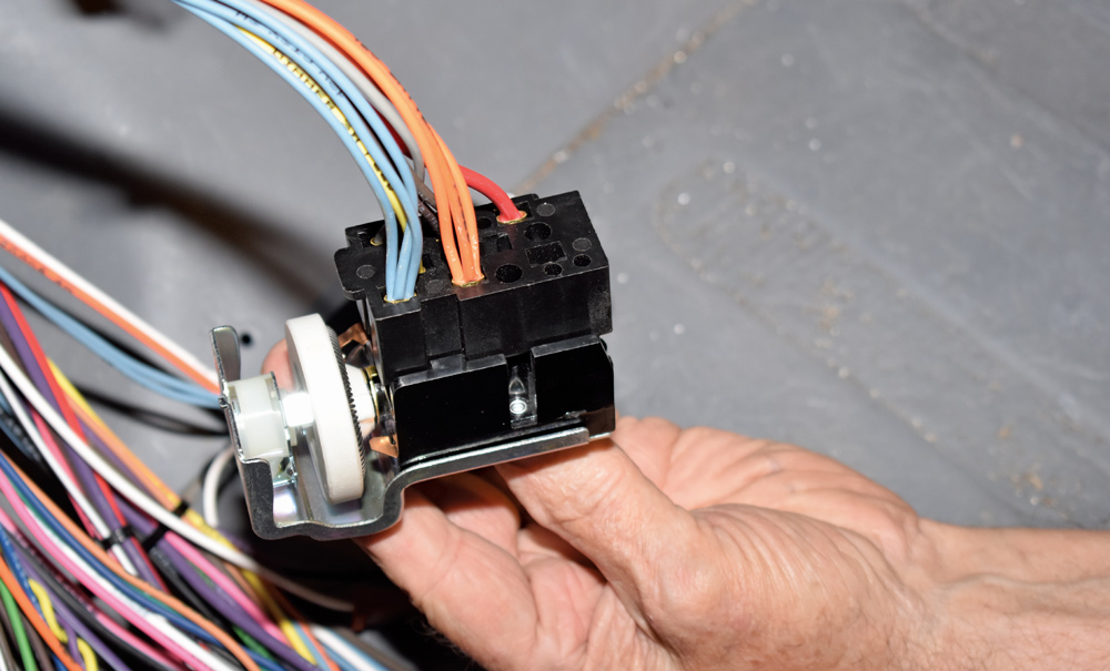 American Autowire headlight switch wiring harness prepared for dashboard install