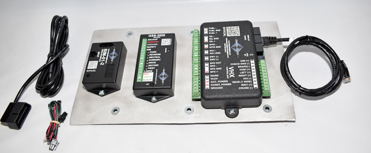 Dakota Digital BIM and GSS modules mounted on aluminum panel for clean installation