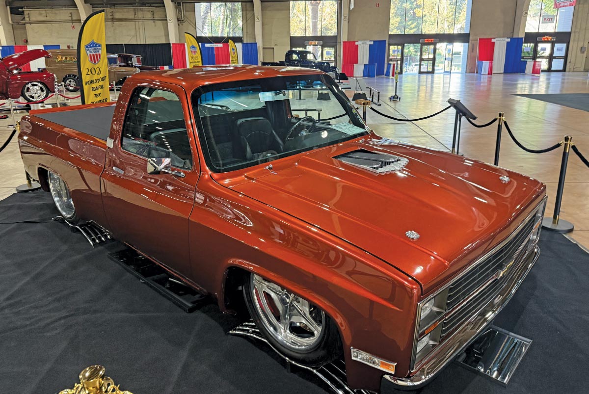 1987 Chevrolet C10 copper pro touring squarebody custom hood indoor show