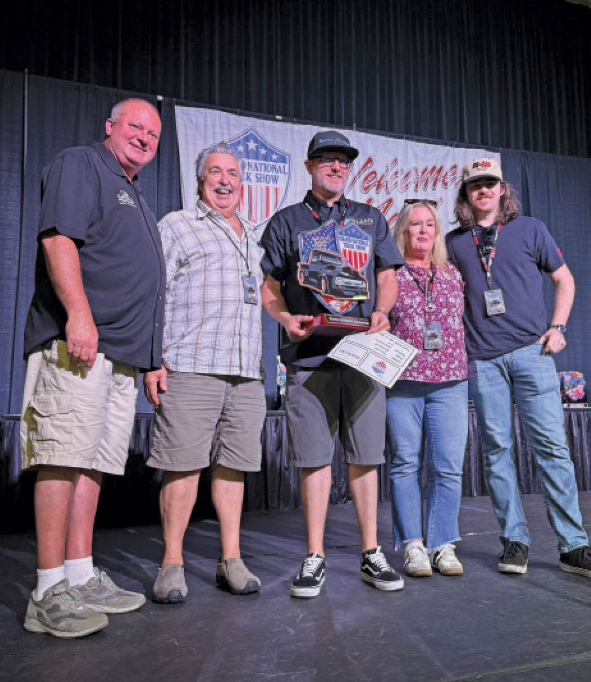 2025 Grand National Truck Show award presentation with custom belt and certificate