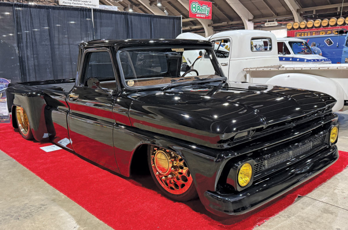 1966 Chevrolet C10 black slammed truck yellow headlights gold wheels