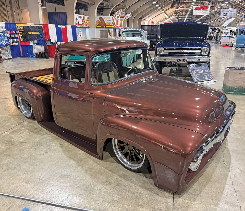1955 Ford F-100 brown Restomod custom truck with wood bed floor