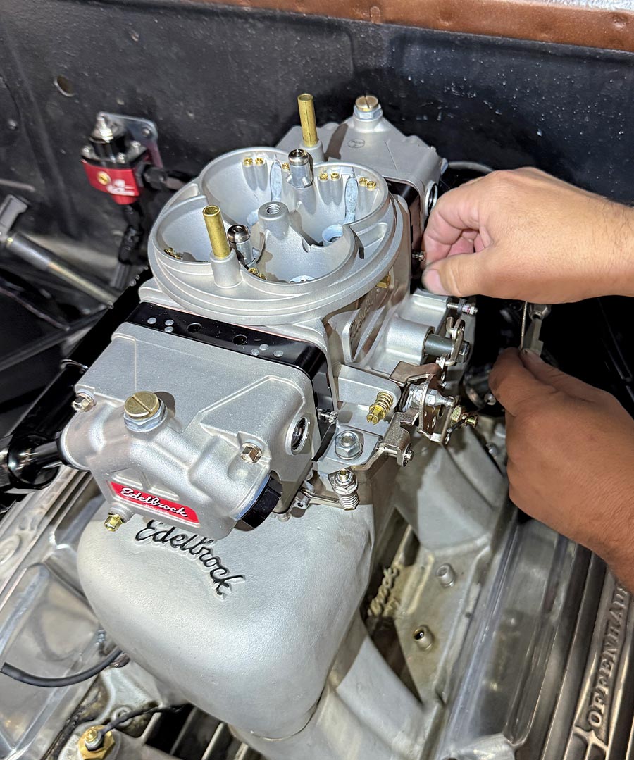 1950 chevy 3100 edelbrock vrs415 fuel rail installed black anodized fittings braided lines